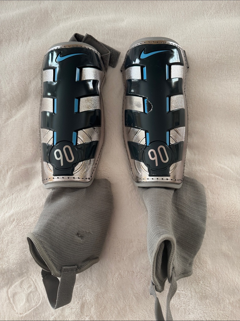 Nike Black & Silver Soccer Shin Guards with Blue Accents